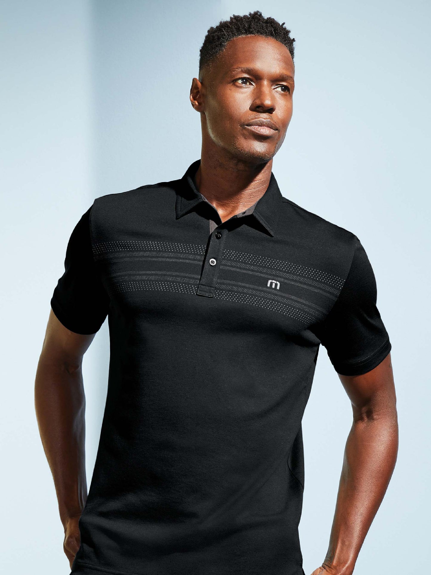 EC103. TravisMathew Monterey Chest Stripe Polo